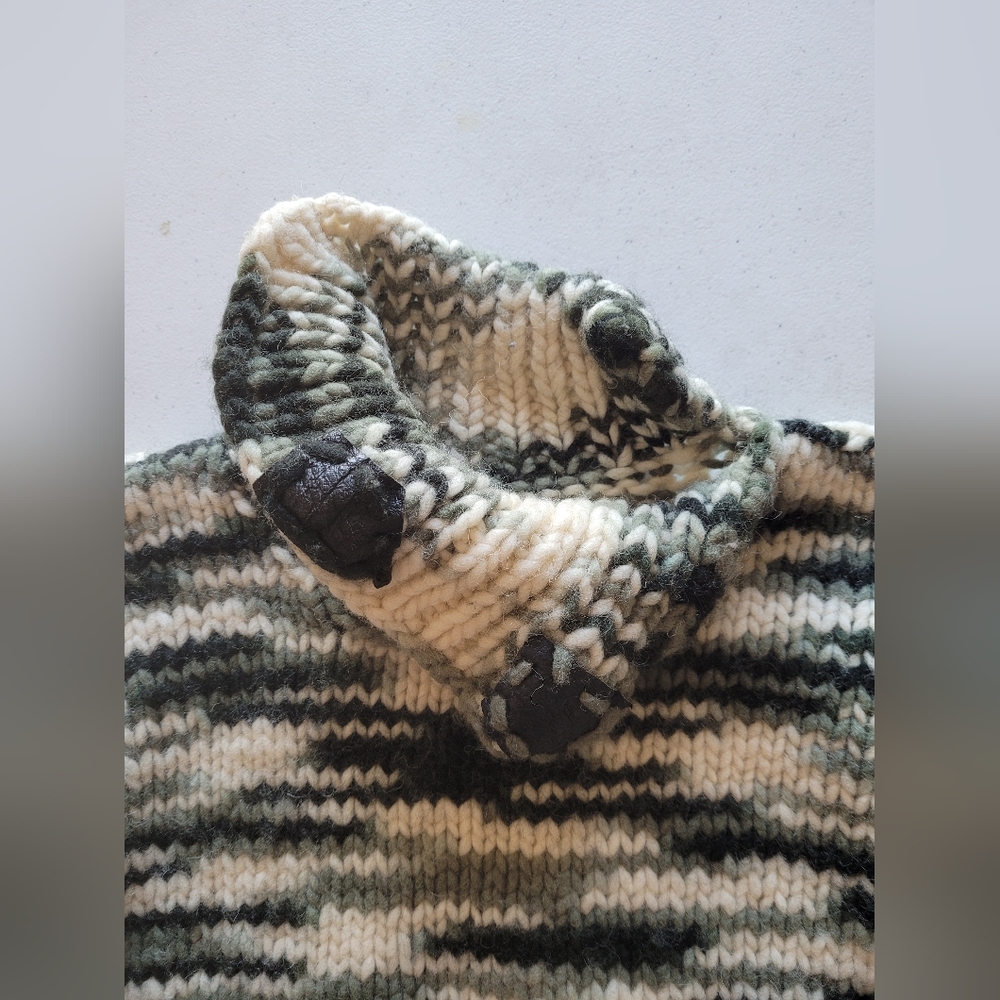 Handknit wool sweater with unique neck design